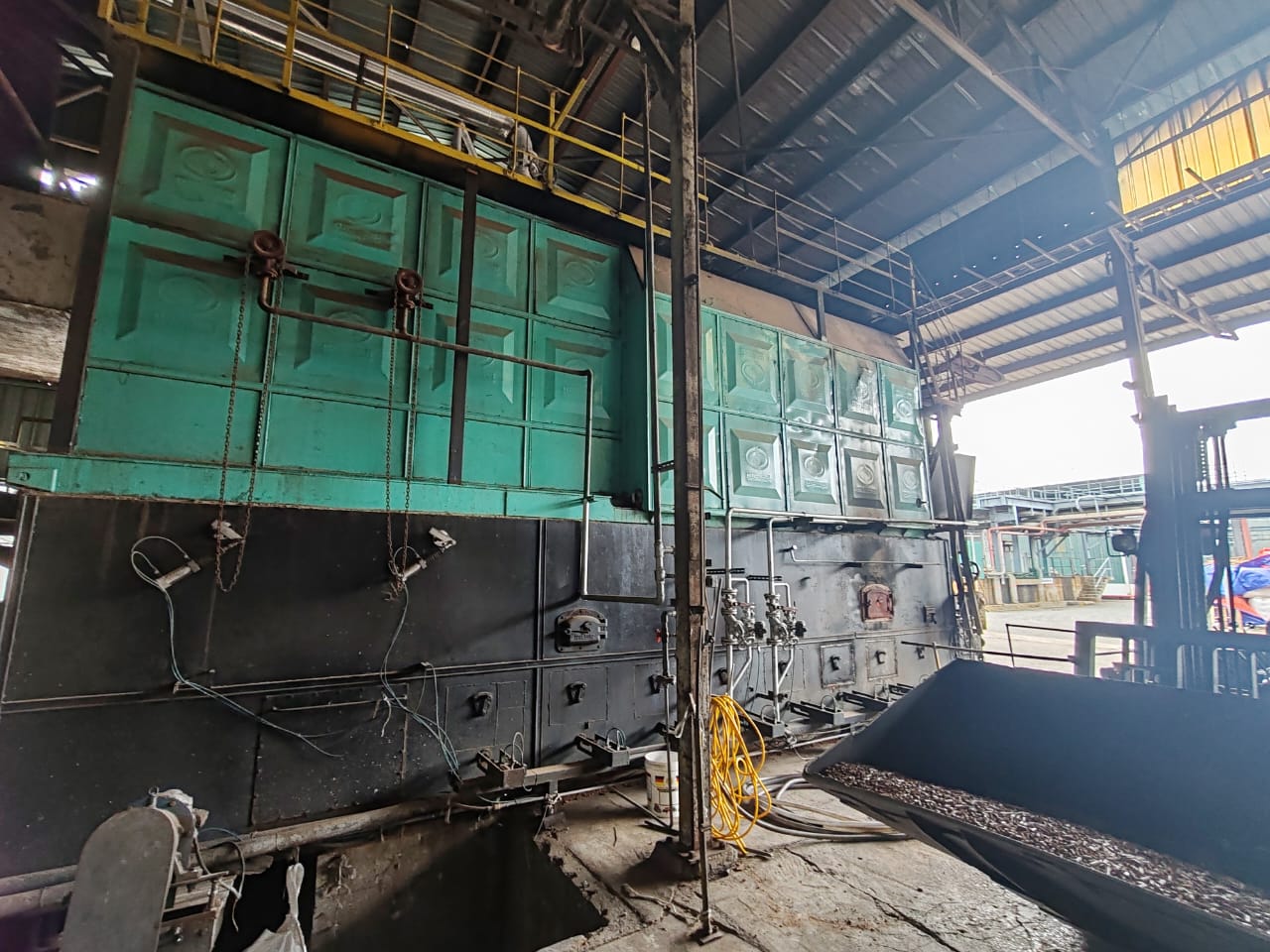 Technician performing industrial boiler maintenance and overhauling service in Malaysia