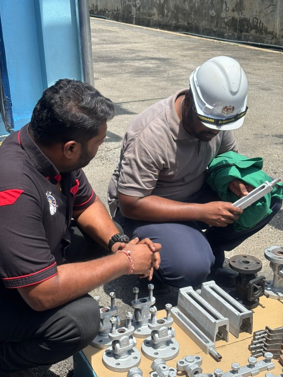 PK Comrades engineers inspecting and servicing boiler safety valves and components during annual overhaul in Malaysia