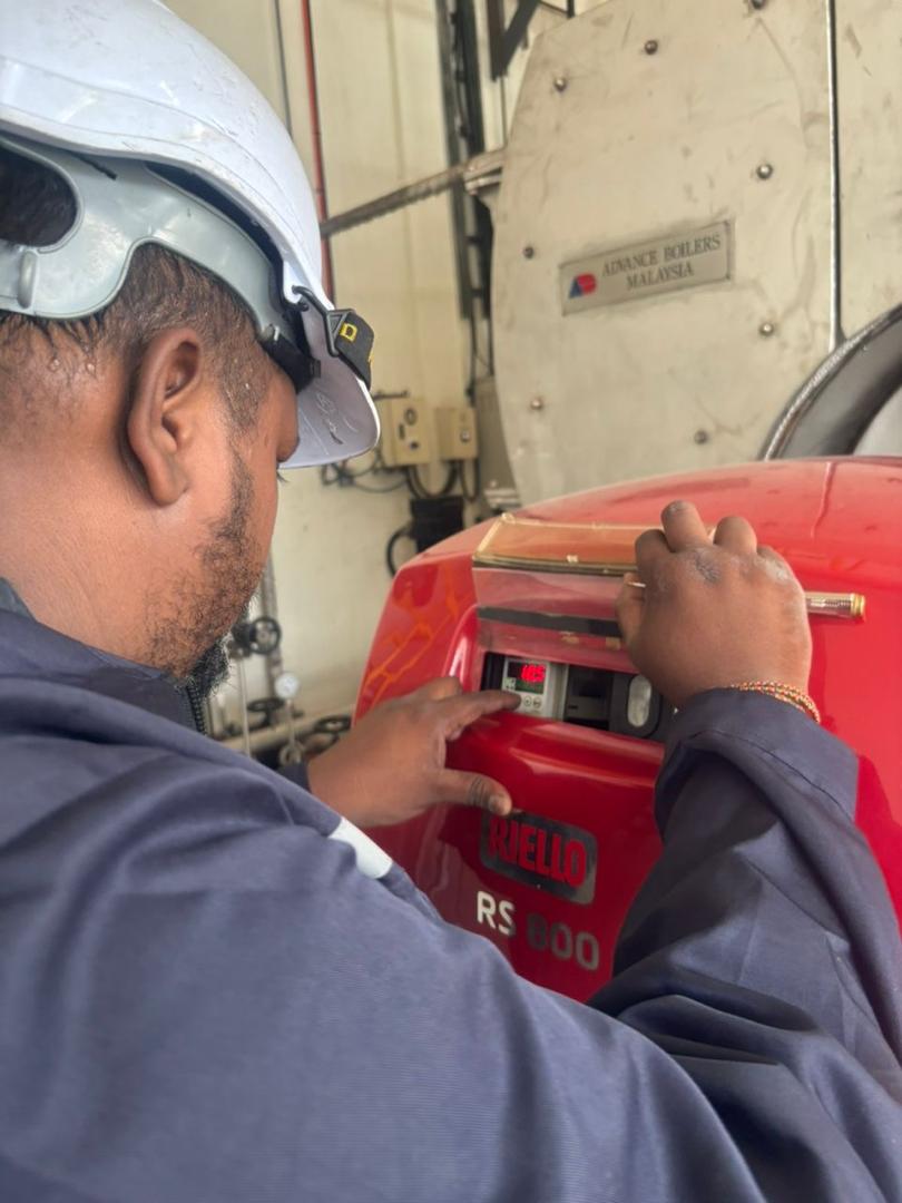 Close-up of industrial burner commissioning, tuning and troubleshooting in Malaysia